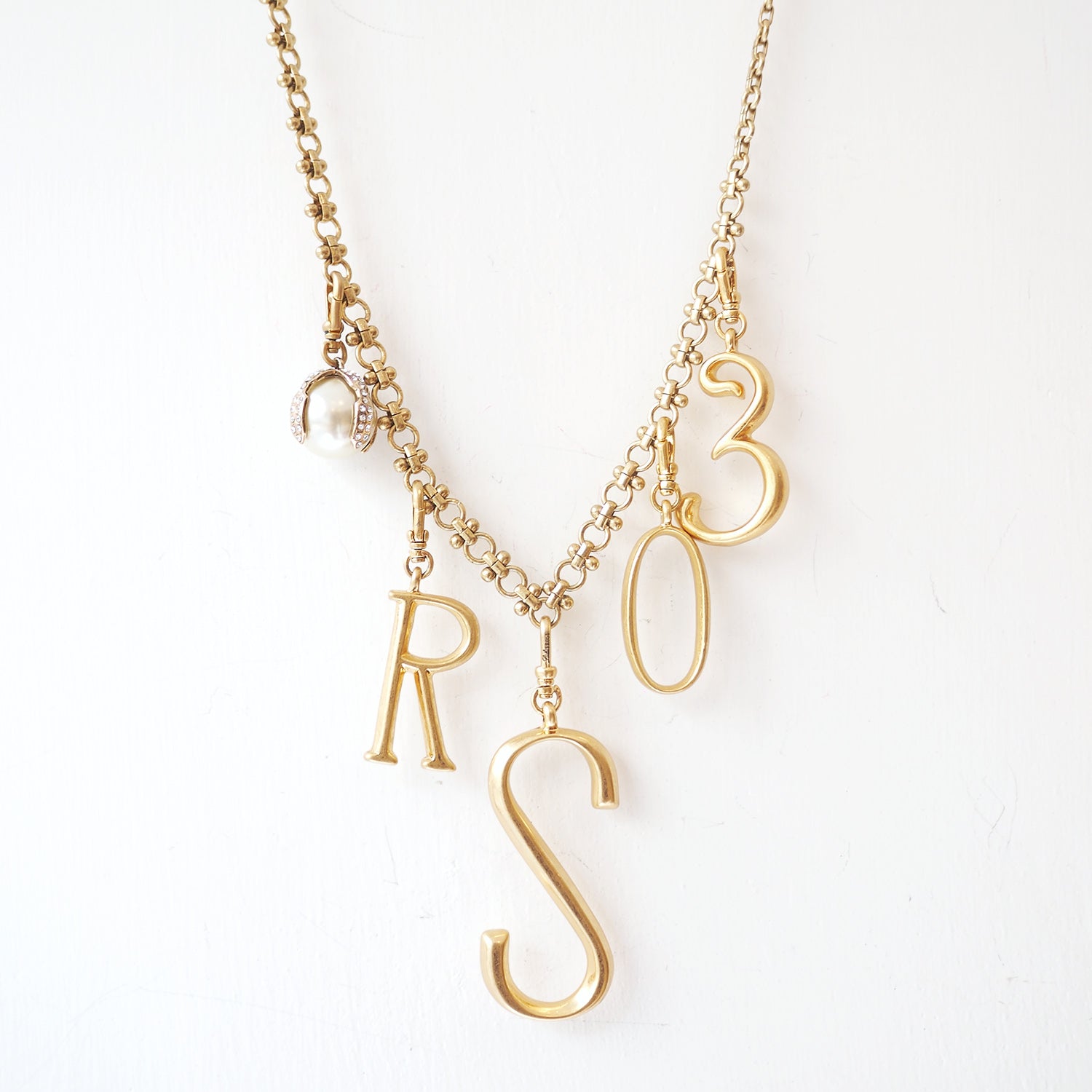 Lulu Frost Plaza Letters in a smaller version of the original font from New York's iconic Plaza Hotel. Pair with one of the Plaza chain bases and add additional charms to create a special piece all your own.