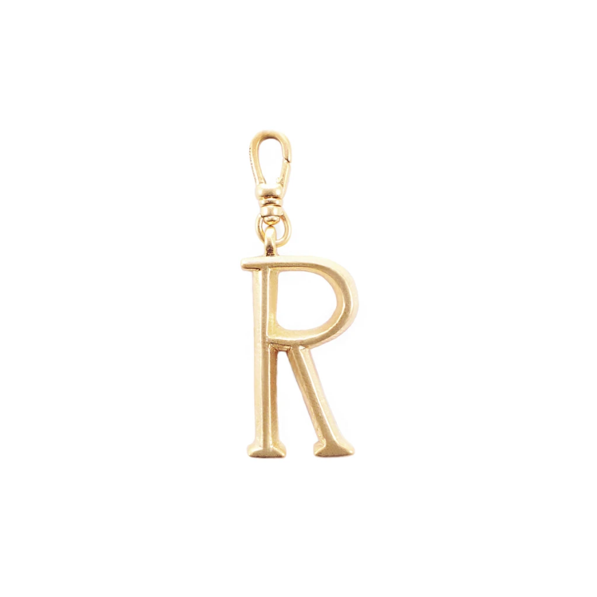 Lulu Frost Plaza Letter R in a smaller version of the original font from New York's iconic Plaza Hotel. Pair with one of the Plaza chain bases and add additional charms to create a special piece all your own. 