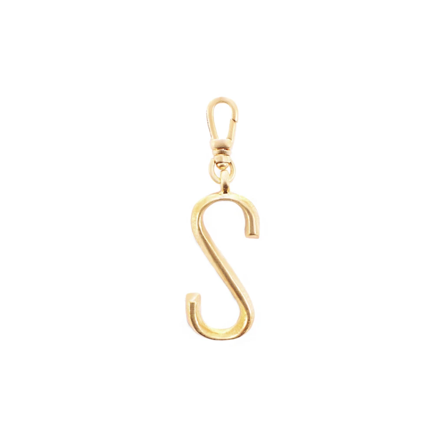 Lulu Frost Plaza Letter S in a smaller version of the original font from New York's iconic Plaza Hotel. Pair with one of the Plaza chain bases and add additional charms to create a special piece all your own. 
