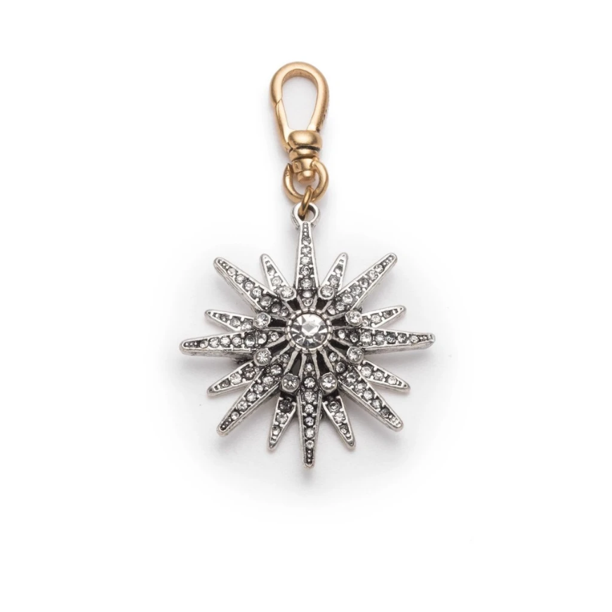 The Lulu Frost radiant charm features an Art Deco-inspired star motif that represents transcendence. Pair with one of the chain bases and add additional charms to create a special piece all your own.
