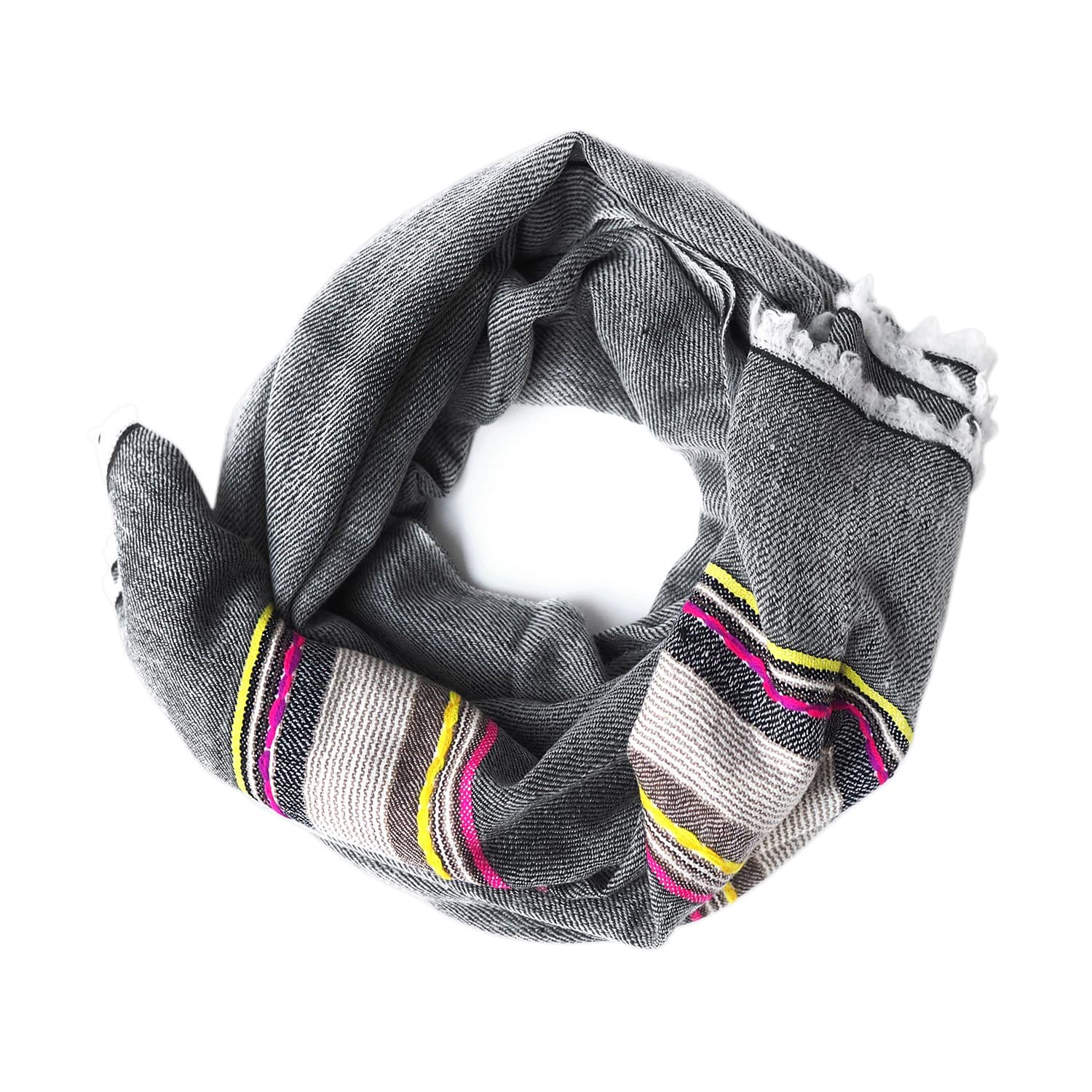 Black with a touch of colour, this pashmina comes from the Himalayan region of India.  Made out of the finest Ibex wool, it will keep you warm and add some colour to your dreary winter outfit. 