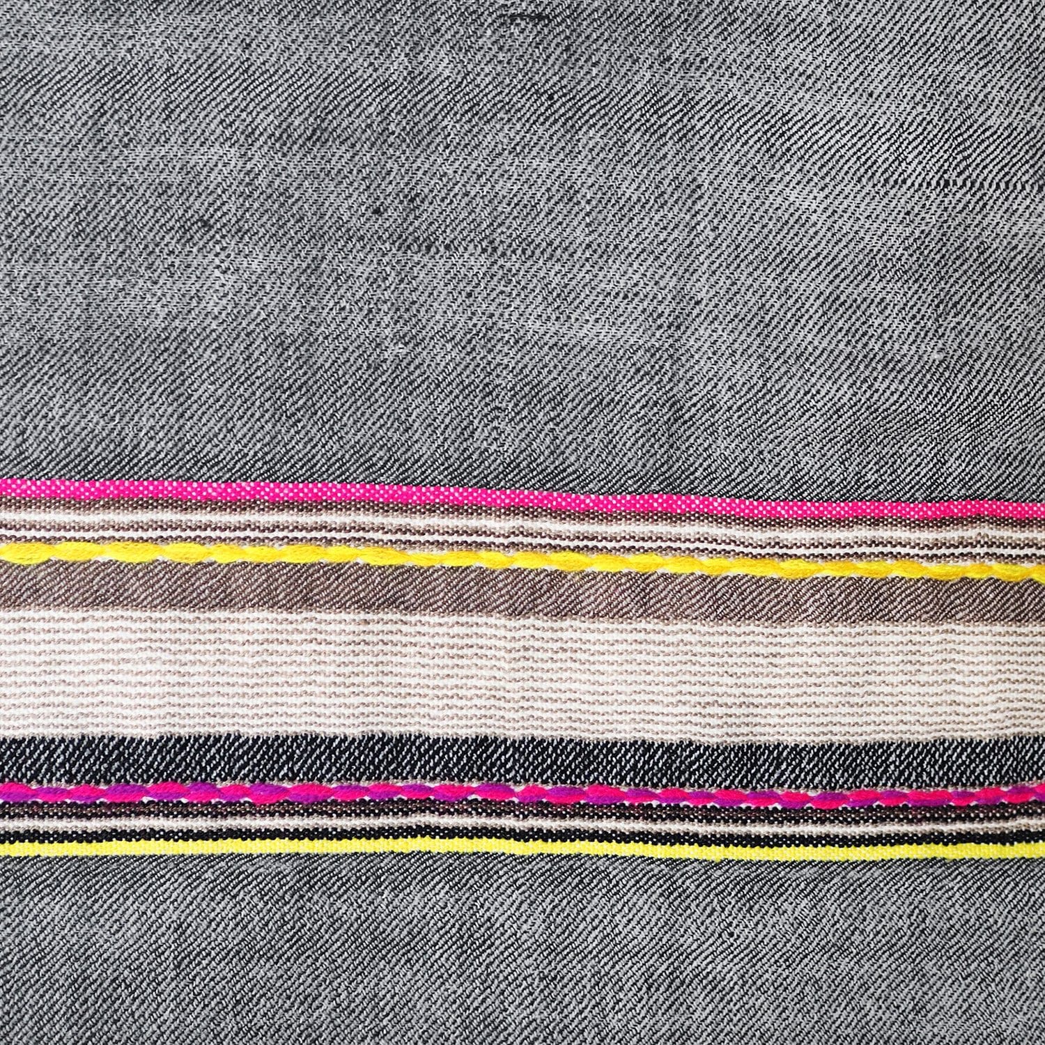 Black with a touch of colour, this pashmina comes from the Himalayan region of India. Made out of the finest Ibex wool, it will keep you warm and add some colour to your dreary winter outfit.