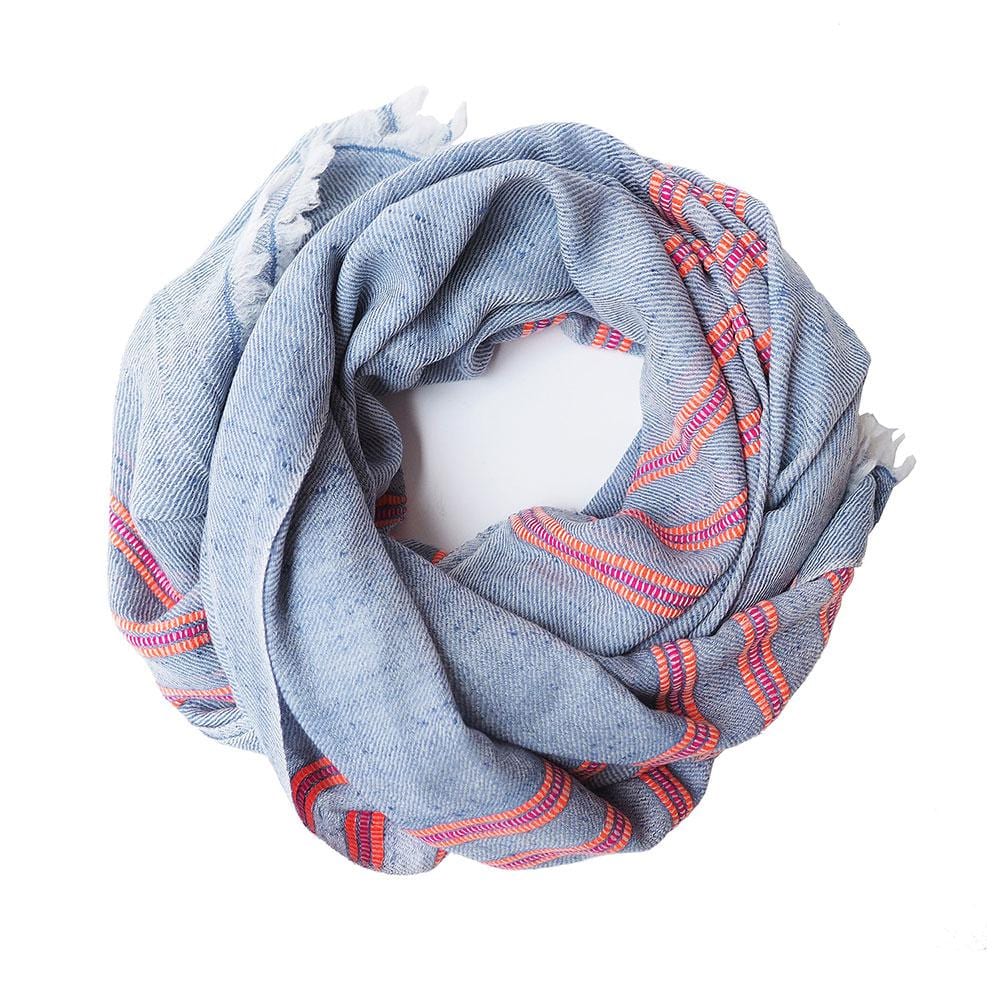 Blue with a touch of colour, this scarf comes from the Himalayan region of India. Made out of the finest Ibex wool, it will keep you warm and add some colour to your dreary winter outfit.
