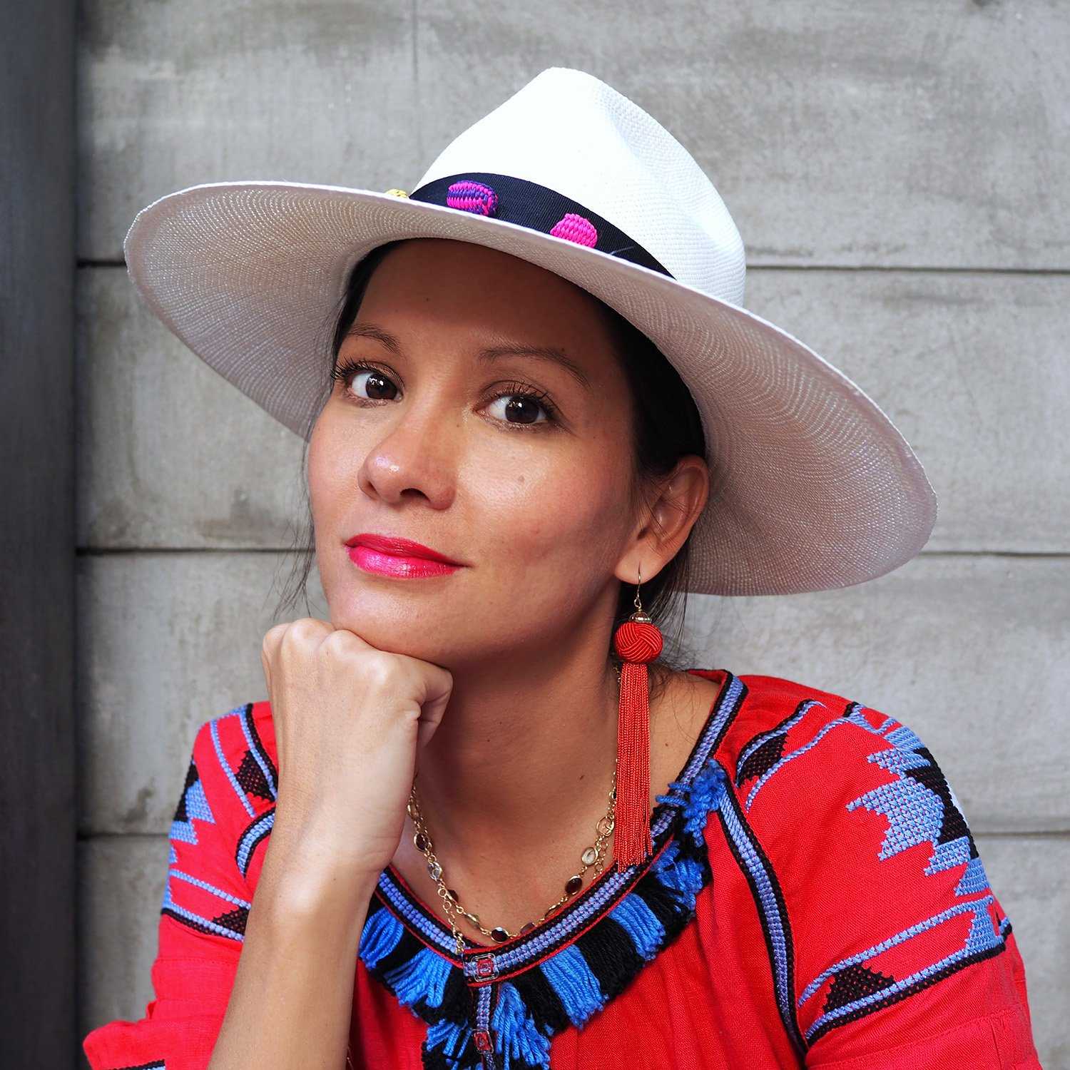 White Panama Hat with colourful weave pom pom beads great for summer Lifestyle picture