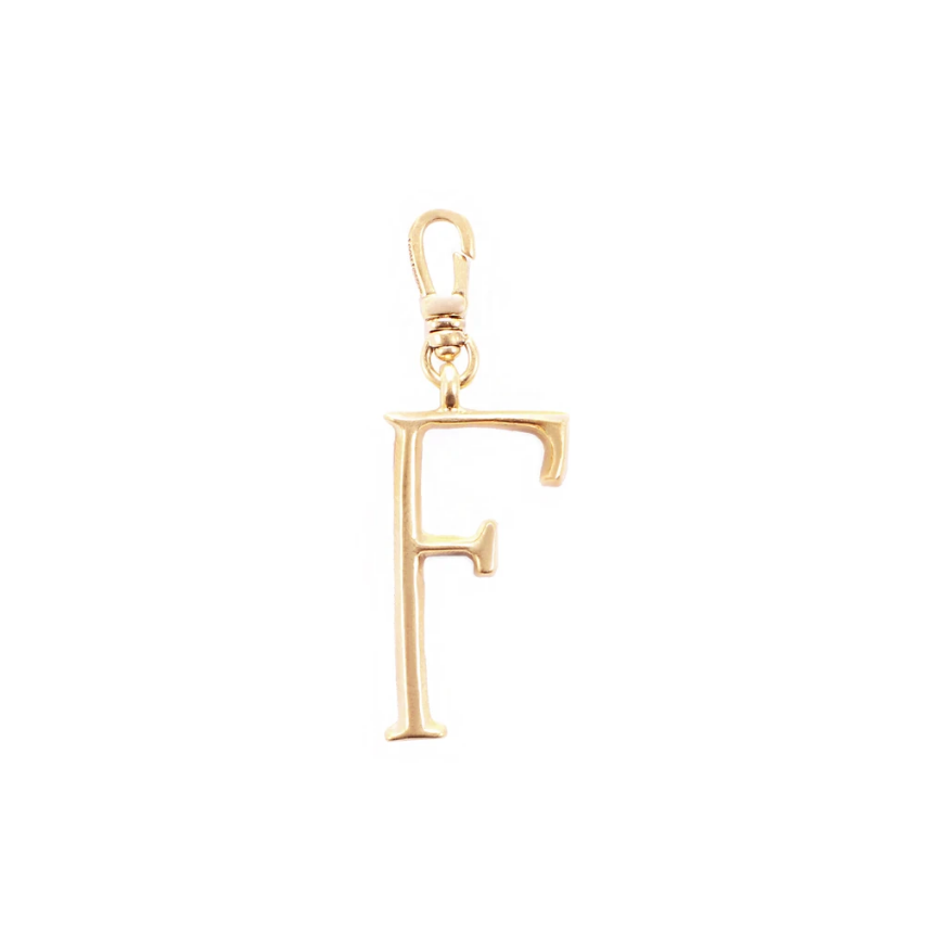 Lulu Frost Plaza Letter F in a smaller version of the original font from New York's iconic Plaza Hotel. Pair with one of the Plaza chain bases and add additional charms to create a special piece all your own. 