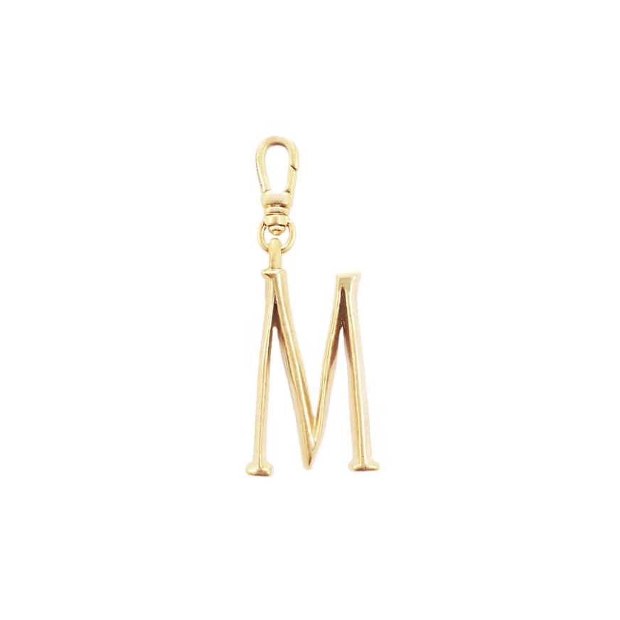 Lulu Frost Plaza Letter M in a smaller version of the original font from New York's iconic Plaza Hotel. Pair with one of the Plaza chain bases and add additional charms to create a special piece all your own. 